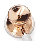 MDF Cardiology stethoscope, white with gold olive eartips, binaurals, and stem